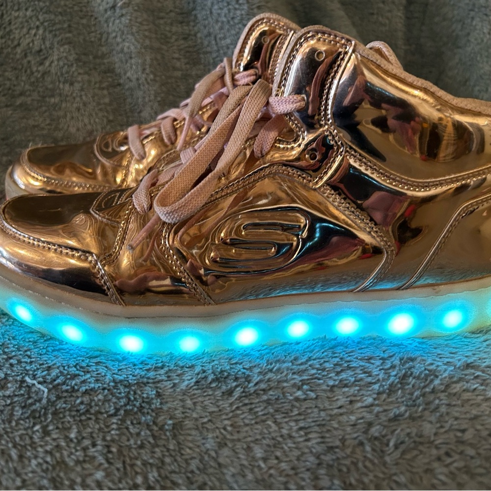 Sketchers light up sneakers in rose gold